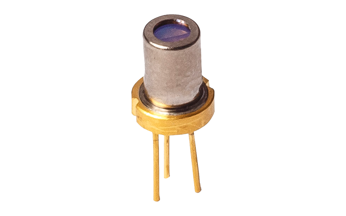 brass colored to-56 laser diode package, circular with 3 electrical pins and a tall silver cap with optical window
